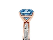 Fancy Blue Cushion Cut Diamond Solitaire Ring Set in Rose gold with Channel-Set Baguette Band and Prong Setting