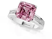 Fancy Pink Asscher Cut Diamond Solitaire Ring Set in White gold with Channel-Set Band and Prong Setting