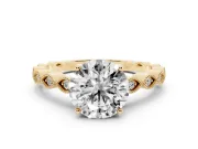 Round Cut Diamond Solitaire Ring Set in Yellow gold with Infinity Twist Pavé Band