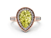 Fancy Yellow Pear Cut Diamond Halo Solitaire Ring Set in Rose gold with Pavé Band and Bezel Setting