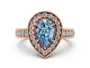 Fancy Blue Pear Cut Diamond Halo Ring Set in Rose gold with Round Accent Halo, Pavé Band and Prong Setting