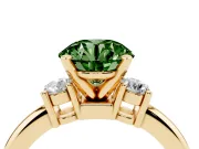 Fancy Green Three-Stone Round Cut Diamond Ring Set in Yellow gold with Prong Setting and Plain Band