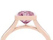 Fancy Pink Bezel Set Radiant Cut Diamond Solitaire Ring Set in Rose gold with Tapered Band