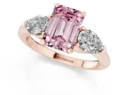Fancy Pink Three-Stone Emerald Cut Diamond Ring Set in Rose gold with Pear Side Stones and Prong Setting