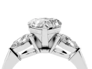 Three-Stone Heart Cut Diamond Ring Set in Platinum with Pear Side Stones and Prong Setting