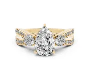 Three-Stone Pear Cut Diamond Twist Band Ring Set in Yellow gold with Pavé Accents and Prong Setting