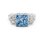 Fancy Blue Princess Cut Diamond Three-Stone Ring Set in Platinum with Braided Band