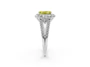Fancy Yellow Emerald Cut Diamond Halo Split Shank Engagement Ring Set in White gold with Prong-Held Center Stone