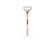 Radiant Cut Diamond Solitaire Engagement Ring Set in Rose gold with Thin Band and Prong Setting