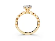 Heart Cut Diamond Solitaire Ring Set in Yellow gold with Bezel-Set Accents on Beaded Band and Prong Setting