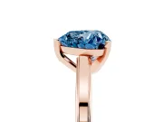 Fancy Blue Heart Cut Diamond Solitaire Ring Set in Rose gold with Prong Setting and Classic Band