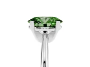 Fancy Green Oval Cut Diamond Solitaire Ring Set in Silver with Prong Setting on a Plain Round Band