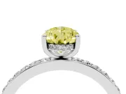 Fancy Yellow Pear Cut Diamond Pavé Band Ring Set in White gold with Prong-Set Center Stone