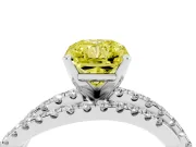 Fancy Yellow Radiant Cut Diamond Solitaire Twist Band Ring Set in White gold with Pavé Setting and Prong Head