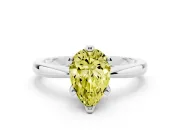 Fancy Yellow Pear Cut Diamond Solitaire Engagement Ring Set in Platinum with Slim Tapered Solitaire Band