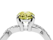 Fancy Yellow Oval Cut Diamond Twist Band Solitaire Set in White gold with Pavé Accents and Prong Setting