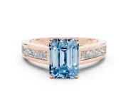 Fancy Blue Emerald Cut Diamond Solitaire Ring Set in Rose gold with Channel-Set Band and Prong Setting