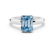 Fancy Blue Emerald Cut Diamond Solitaire Ring Set in Platinum with Prong Head and Smooth Polished Band