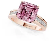 Fancy Pink Asscher Cut Diamond Solitaire Ring Set in Rose gold with Channel-Set Band and Prong Setting