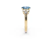 Oval Side Stone Engagement Ring Setting for a Fancy Blue Lab-Grown Diamond | Yellow Gold