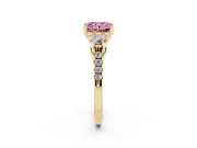 Fancy Pink Three-Stone Radiant Cut Diamond Pavé Band Ring Set in Yellow gold with Prong-Set Trio