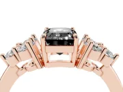Fancy Black Emerald Cut Diamond Solitaire Ring Set in Rose gold with Cluster Accents on Each Side