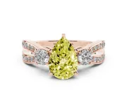 Pear-Shaped Three-Stone Twist Engagement Ring Setting for a Fancy Yellow Lab-Grown Diamond | Rose Gold