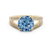 Fancy Blue Round Cut Diamond Split Shank Ring Set in Yellow gold with Pavé Band and Prong Setting