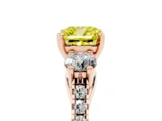 Fancy Yellow Three-Stone Cushion Cut Diamond Pavé Band Ring Set in Rose gold with Prong-Set Trio