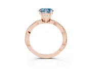 Fancy Blue Heart Cut Diamond Solitaire Ring Set in Rose gold with Twisted Band and Bead Prong Setting