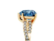 Fancy Blue Heart Cut Diamond Solitaire Engagement Ring Set in Yellow gold with Twisted Pavé Band and Prong Setting
