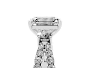 Emerald Cut Diamond Three-Stone Ring Set in White gold with Pavé Split Shank and Prong Setting