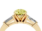 Fancy Yellow Pear Cut Diamond Solitaire Ring Set in Yellow gold with Tapered Baguette Accents and Prong Setting