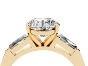 Round Cut Diamond Solitaire Ring Set in Yellow gold with Tapered Baguette Side Stones and Prong Setting