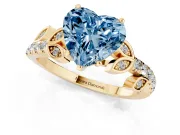 Fancy Blue Heart Cut Diamond Solitaire Leaf-Inspired Ring Set in Yellow gold with Pavé Band and Prong Setting