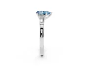 Fancy Blue Pear Cut Diamond Solitaire Ring Set in Silver with Tapered Baguette Accents and Prong Setting