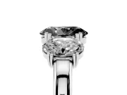 Fancy Black Oval Cut Diamond Three-Stone Ring Set in White gold with Polished Band and Prong Setting