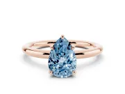 Fancy Blue Pear Cut Diamond Solitaire Ring Set in Rose gold with Thin Band and Prong Setting