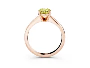 Fancy Yellow Oval Cut Diamond Solitaire Ring Set in Rose gold with Prong Setting on a Plain Round Band