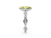 Fancy Yellow Marquise Cut Diamond Twist Band Solitaire Ring Set in Platinum with Leaf Prong Setting and Accent Stones