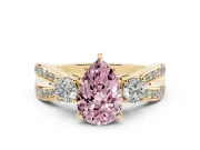 Fancy Pink Three-Stone Pear Cut Diamond Twist Band Ring Set in Yellow gold with Pavé Accents and Prong Setting