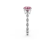Fancy Pink Round Cut Diamond Solitaire Ring Set in Platinum with Infinity Twist Pavé Band