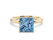 Fancy Blue Princess Cut Diamond Solitaire Engagement Ring Set in Yellow gold with Prong Setting and Polished Band