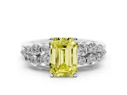 Fancy Yellow Emerald Cut Diamond Cluster Engagement Ring Set in Silver with Pavé Band and Prong Setting