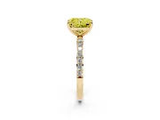 Fancy Yellow Radiant Cut Diamond Solitaire Ring Set in Yellow gold with Round Pavé Band and Prong Setting