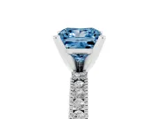 Fancy Blue Princess Cut Diamond Solitaire Ring Set in White gold with Slim Pavé Band and Prong Setting