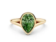Fancy Green Bezel Set Pear Cut Diamond Solitaire Ring Set in Yellow gold with Tapered Band