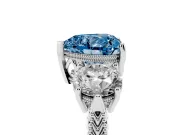 Fancy Blue Heart Cut Diamond Three-Stone Ring Set in Platinum with Milgrain Band