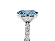 Fancy Blue Oval Cut Diamond Solitaire Ring Set in Platinum with Round Pavé Band and Prong Setting