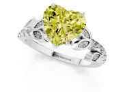 Fancy Yellow Heart Cut Diamond Solitaire Leaf-Inspired Ring Set in Platinum with Pavé Band and Prong Setting